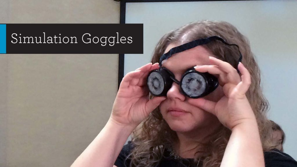 Woman wearing googles that simulate a visual impairment
